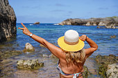 back of female in the beach in the summer. Body diversity and body positive concept.